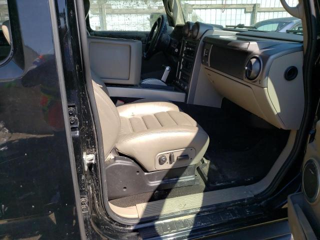 Фото 5 с аукциона – 2003 HUMMER H2 с VIN 5GRGN23U63H127849