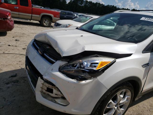 Photo 9 from auction – 2013 FORD ESCAPE TIT with VIN 1FMCU0J97DUB77735