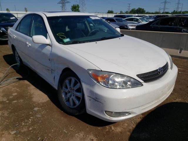 TOYOTA CAMRY LE 2004 with VIN 4T1BF30K34U075067 - Photo from auction