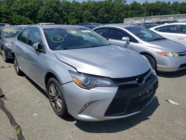 TOYOTA CAMRY LE 2017 with VIN 4T1BF1FK2HU390704 - Photo from auction