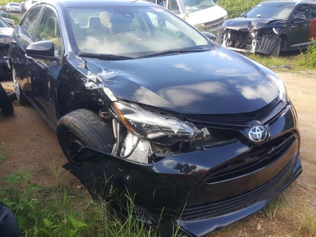 TOYOTA COROLLA L 2019 with VIN 5YFBURHE0KP858174 - Photo from auction