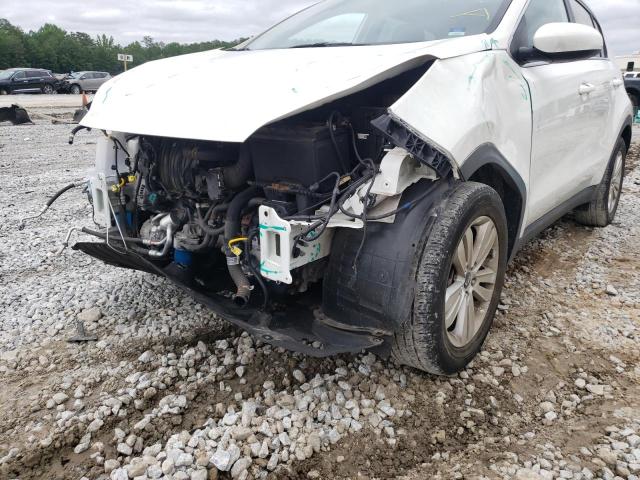 Photo 9 from auction – 2019 KIA SPORTAGE L with VIN KNDPM3AC8K7601065