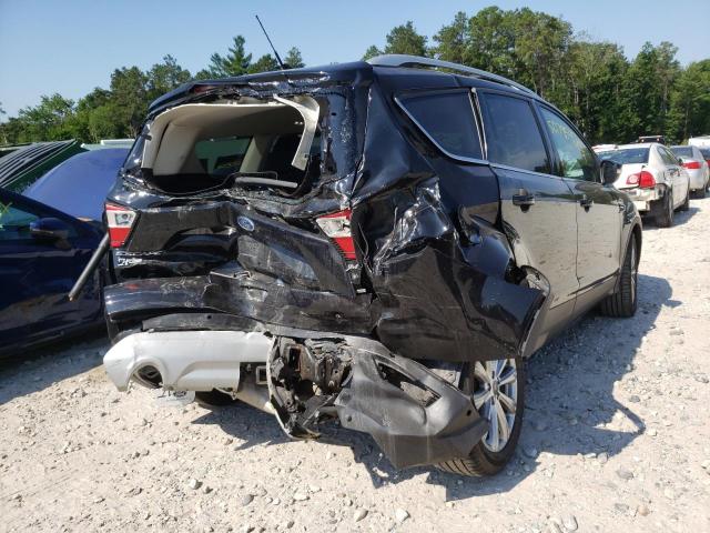 Photo 4 from auction – 2018 FORD ESCAPE TIT with VIN 1FMCU9J94JUD11763