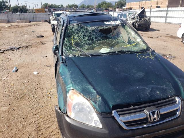 Photo 9 from auction – 2004 HONDA CR-V EX with VIN JHLRD788X4C057408