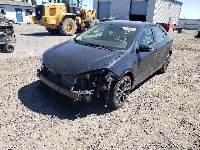 Photo 2 from auction – 2017 TOYOTA COROLLA L with VIN 2T1BURHEXHC945802