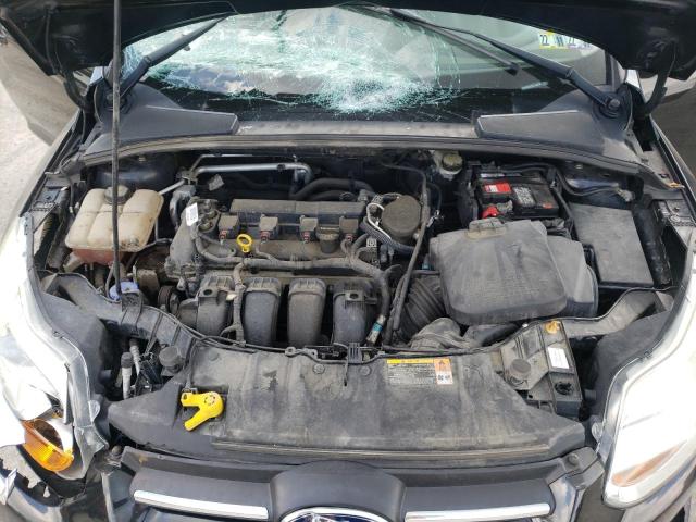 Foto 7 de la subasta – 2014 FORD FOCUS SE con VIN 1FADP3K22EL142830
