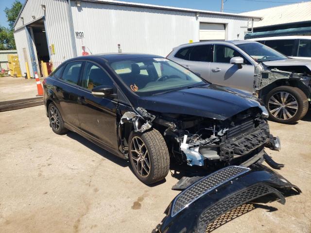 FORD FOCUS SE 2015 with VIN 1FADP3F2XFL268753 - Photo from auction