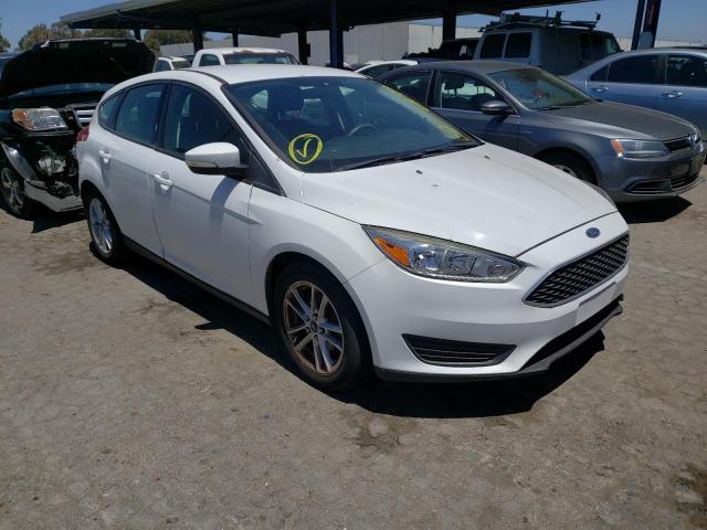 FORD FOCUS SE 2015 with VIN 1FADP3K20FL307307 - Photo from auction