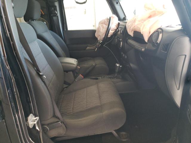 Photo 5 from auction – 2011 JEEP WRANGLER U with VIN 1J4HA3H14BL561926