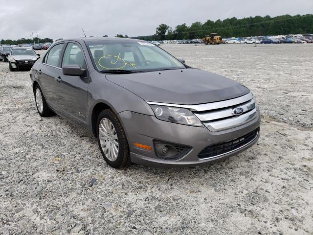 FORD FUSION HYB 2012 with VIN 3FADP0L31CR359631 - Photo from auction