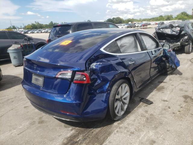 Photo 4 from auction – 2018 TESLA MODEL 3 with VIN 5YJ3E1EA9JF009871