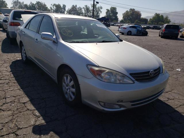 TOYOTA CAMRY LE 2003 with VIN 4T1BE30K53U646933 - Photo from auction