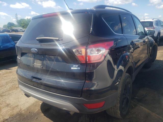 Photo 4 from auction – 2017 FORD ESCAPE SE with VIN 1FMCU9GD0HUE92754