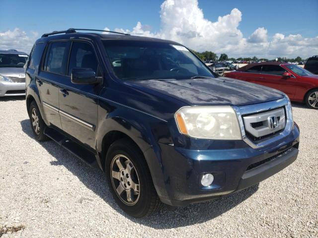 HONDA PILOT TOUR 2011 with VIN 5FNYF4H96BB067461 - Photo from auction