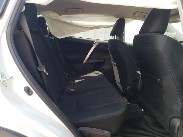 Photo 6 from auction – 2018 TOYOTA RAV4 LE with VIN JTMBFREV2JJ261092