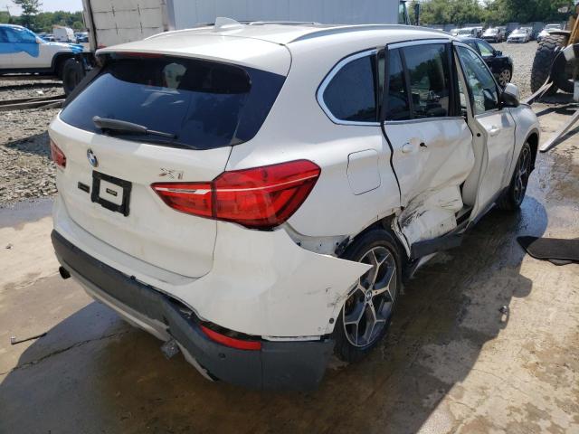 Photo 4 from auction – 2017 BMW X1 XDRIVE2 with VIN WBXHT3C30H5F83157
