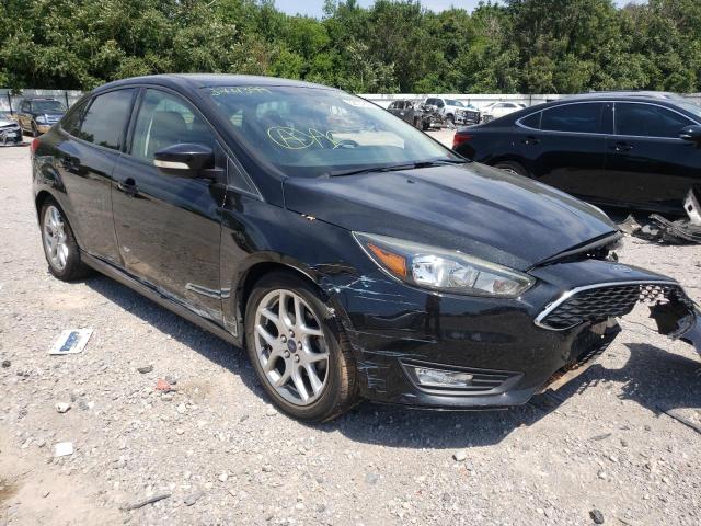 FORD FOCUS SE 2015 with VIN 1FADP3F20FL374399 - Photo from auction