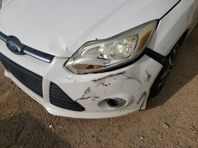 Photo 9 from auction – 2012 FORD FOCUS SE with VIN 1FAHP3F24CL132485