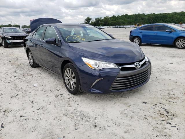 TOYOTA CAMRY LE 2016 with VIN 4T1BF1FK4GU583077 - Photo from auction