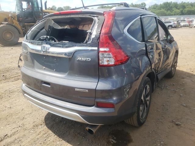 Photo 4 from auction – 2015 HONDA CR-V TOURI with VIN 5J6RM4H90FL077183