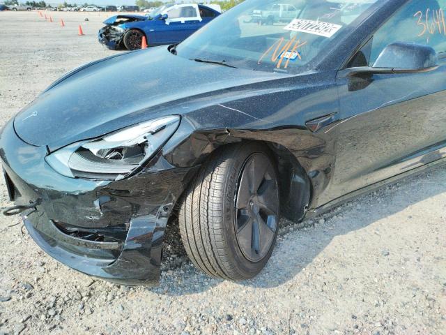 Photo 9 from auction – 2022 TESLA MODEL 3 with VIN 5YJ3E1EBXNF190994