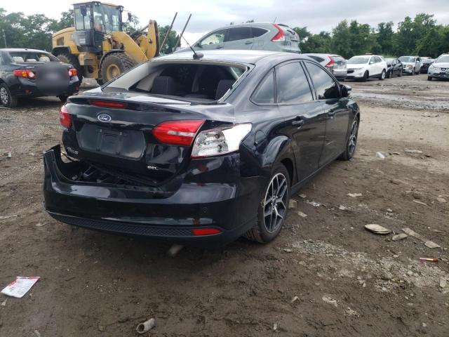 Photo 4 from auction – 2017 FORD FOCUS SEL with VIN 1FADP3H27HL242420