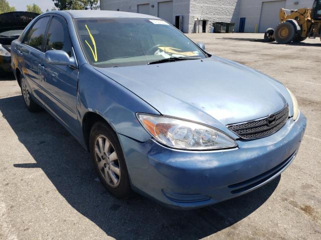 TOYOTA CAMRY LE 2004 with VIN 4T1BE32K44U883475 - Photo from auction
