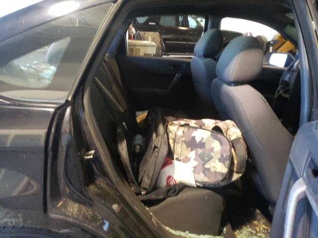 Photo 6 from auction – 2011 FORD FOCUS SE with VIN 1FAHP3FNXBW105427