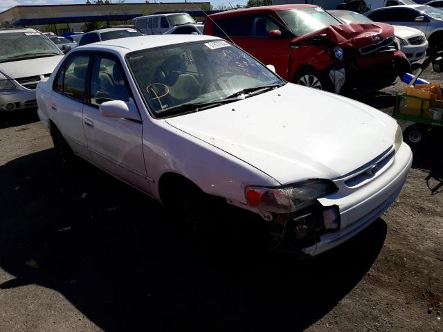 TOYOTA COROLLA VE 2000 with VIN 1NXBR12E4YZ329023 - Photo from auction