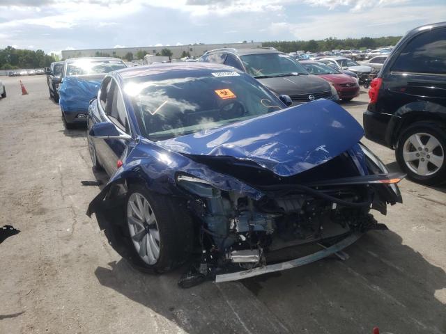 TESLA MODEL 3 2018 with VIN 5YJ3E1EA9JF009871 - Photo from auction