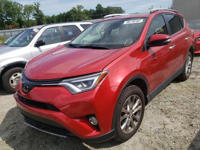 Photo 2 from auction – 2016 TOYOTA RAV4 LIMIT with VIN JTMYFREV8GJ097284