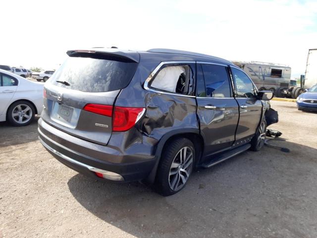 Photo 4 from auction – 2016 HONDA PILOT TOUR with VIN 5FNYF5H99GB027369