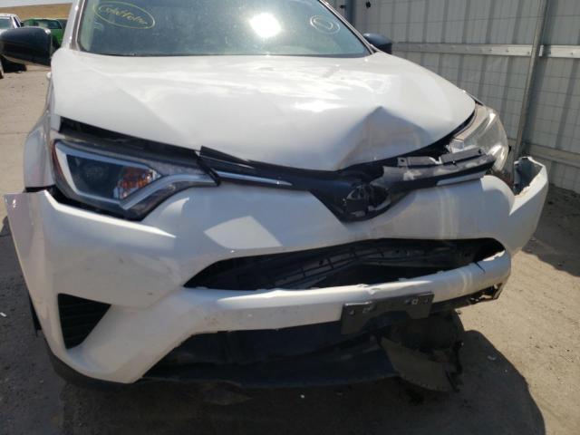 Photo 9 from auction – 2018 TOYOTA RAV4 LE with VIN JTMBFREV2JJ261092