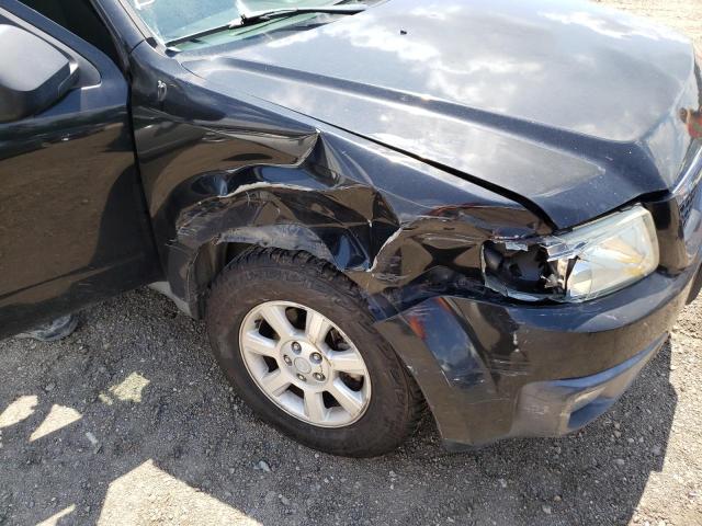 Photo 9 from auction – 2011 MAZDA TRIBUTE I with VIN 4F2CY0C74BKM00679