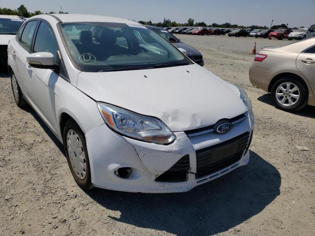 Foto 9 de la subasta – 2013 FORD FOCUS SE con VIN 1FADP3F21DL296549