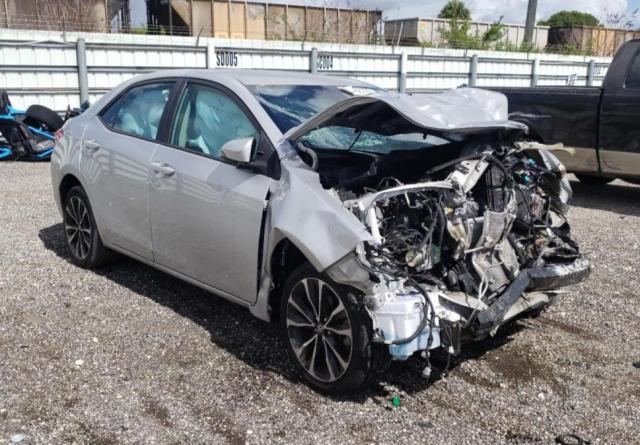 TOYOTA COROLLA L 2018 with VIN 5YFBURHE7JP783830 - Photo from auction