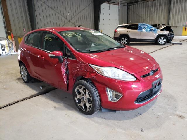 FORD FIESTA 2011 with VIN 3FADP4FJ4BM217268 - Photo from auction