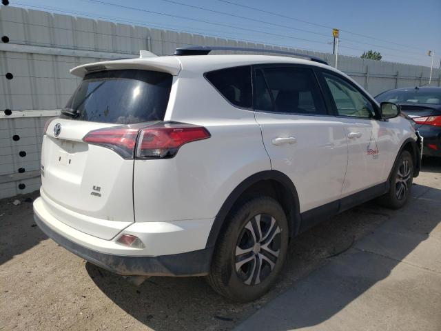 Photo 4 from auction – 2018 TOYOTA RAV4 LE with VIN JTMBFREV2JJ261092