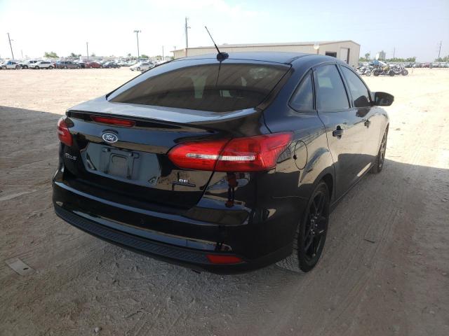 Photo 4 from auction – 2016 FORD FOCUS SE with VIN 1FADP3F26GL400165