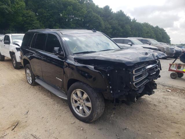 GMC YUKON SLE 2019 with VIN 1GKS1AKC3KR304431 - Photo from auction
