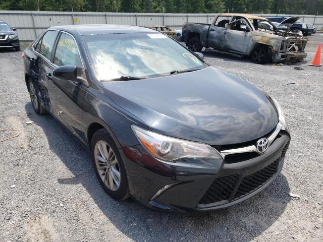 TOYOTA CAMRY LE 2017 with VIN 4T1BF1FK8HU808165 - Photo from auction