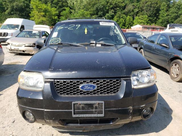 Photo 9 from auction – 2005 FORD ESCAPE LIM with VIN 1FMYU04105KB77522