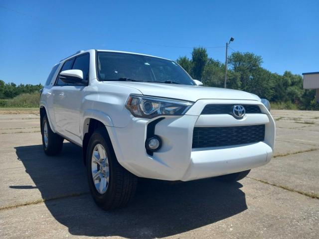 TOYOTA 4RUNNER SR 2014 with VIN JTEZU5JR9E5077073 - Photo from auction