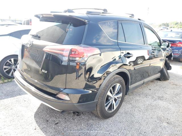 Photo 4 from auction – 2016 TOYOTA RAV4 XLE with VIN 2T3WFREV4GW267424