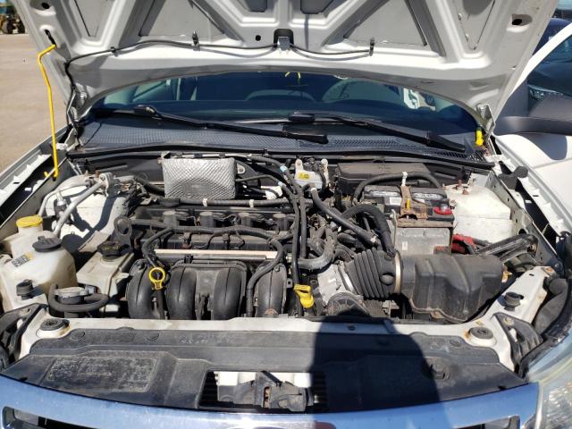 Photo 7 from auction – 2009 FORD FOCUS S with VIN 1FAHP34N99W247717