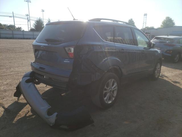 Photo 4 from auction – 2018 FORD ESCAPE SE with VIN 1FMCU0GD4JUC90615