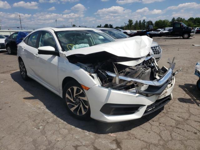 HONDA CIVIC EX 2018 with VIN 2HGFC2F75JH530657 - Photo from auction