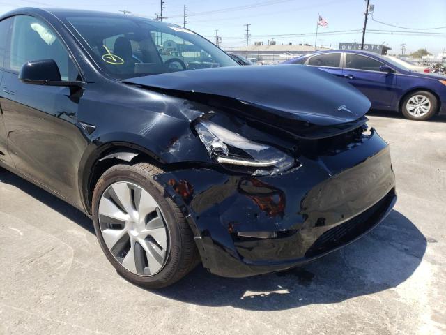 Photo 9 from auction – 2021 TESLA MODEL Y with VIN 5YJYGDEE2MF303749