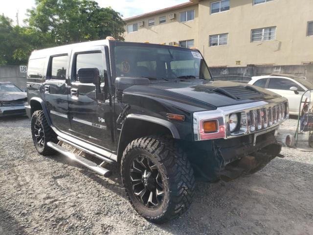 HUMMER H2 2006 with VIN 5GRGN23UX6H101694 - Photo from auction