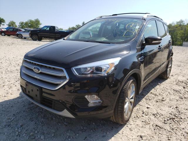 Photo 2 from auction – 2018 FORD ESCAPE TIT with VIN 1FMCU9J94JUD11763